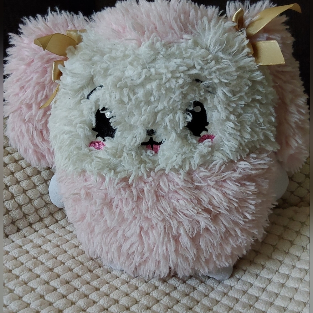 A poodle dog plushie.